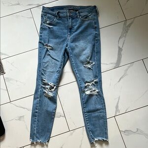 American Eagle Blue Jeggings with Distressed Details